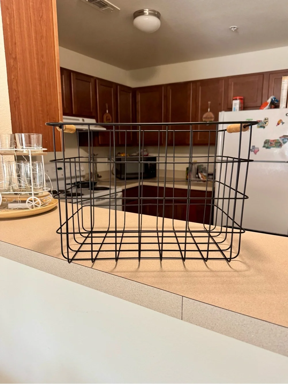 Modern Farmhouse Black Wire Storage Basket with Wooden Handle - Home Accents